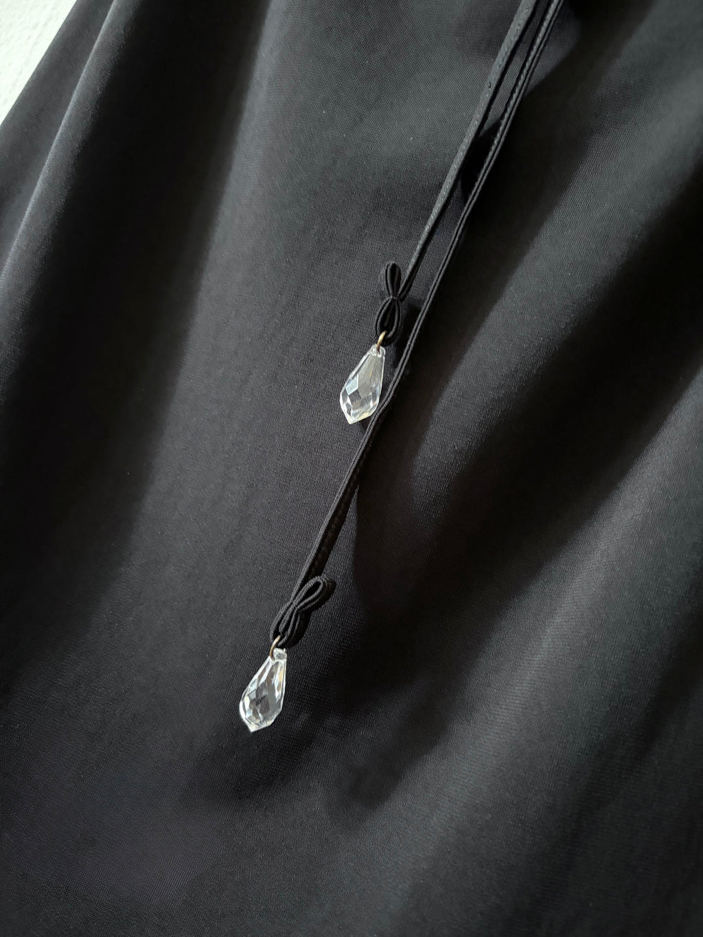 Black skirt with diamanté tie detail