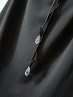 Black skirt with diamanté tie detail