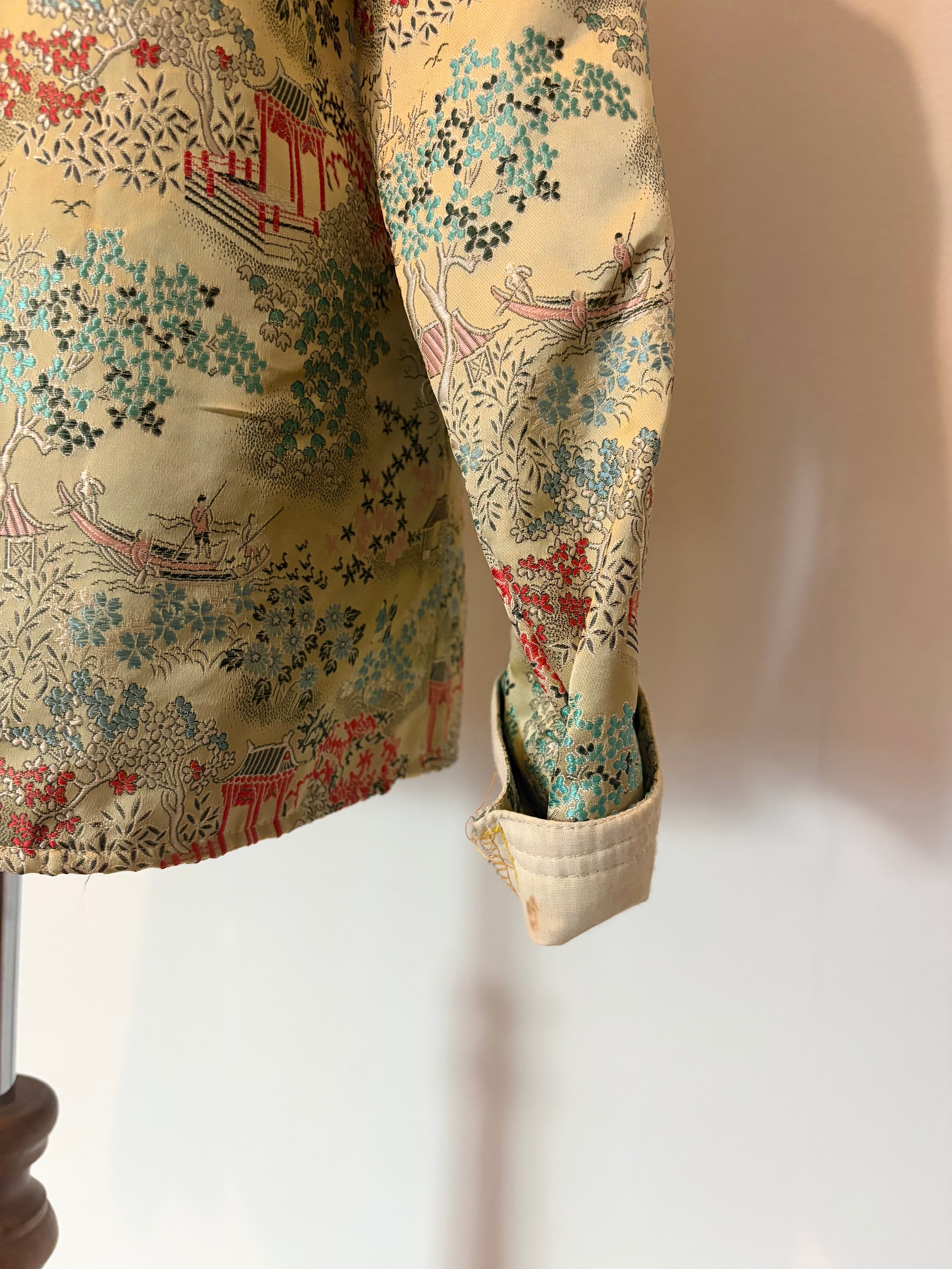 Oriental print jacket with frog closure