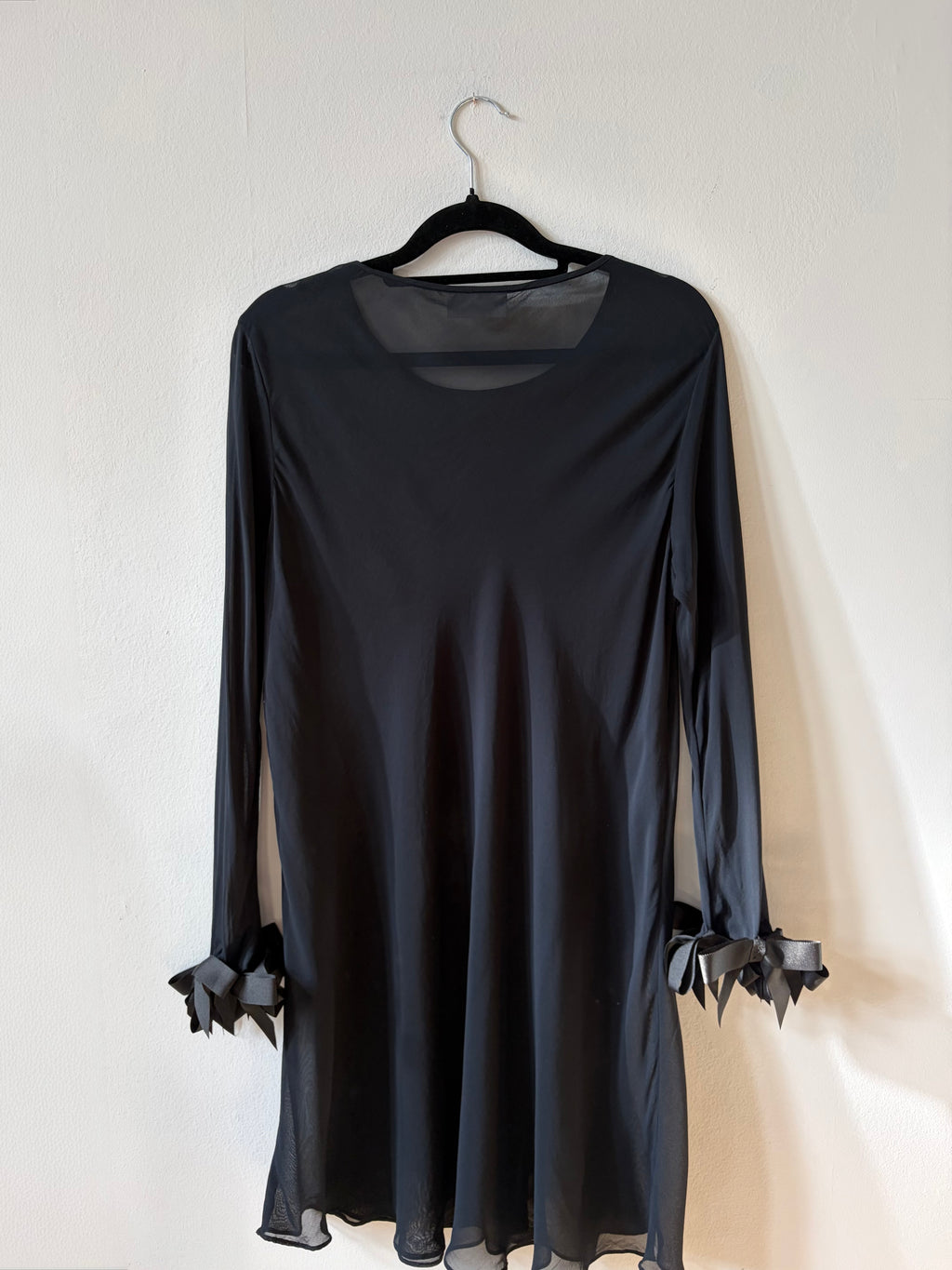 Black mini dress with bow sleeve details