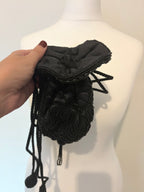 Drawstring beaded bag with tassel