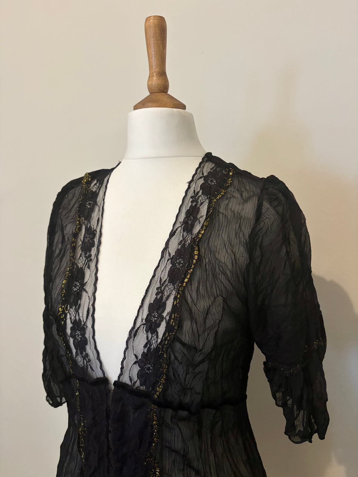 Sheer top with lace details