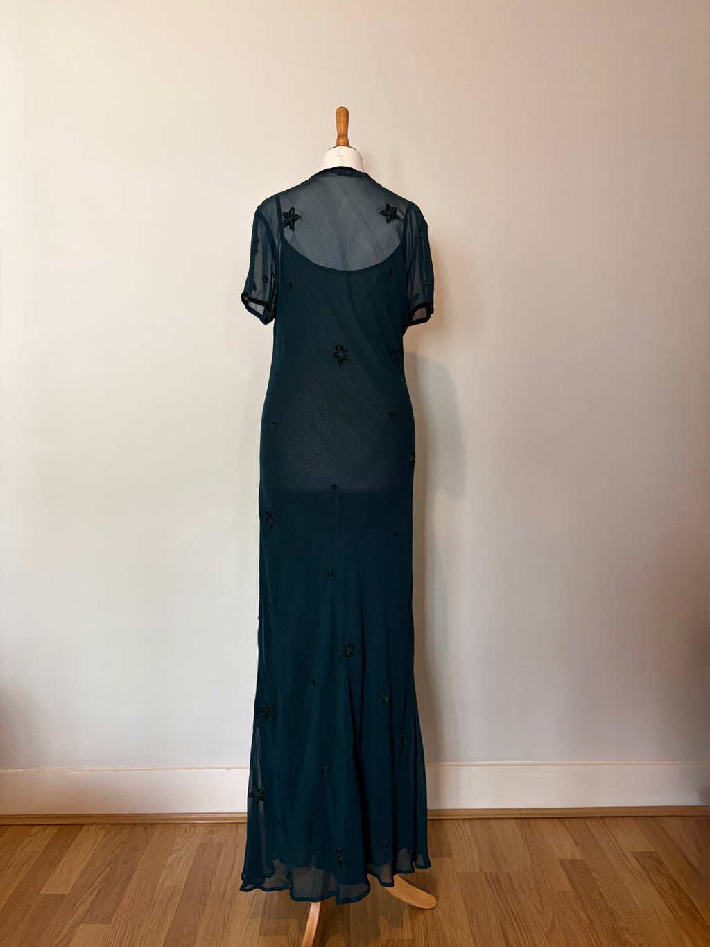 Emerald green dress with velvet details