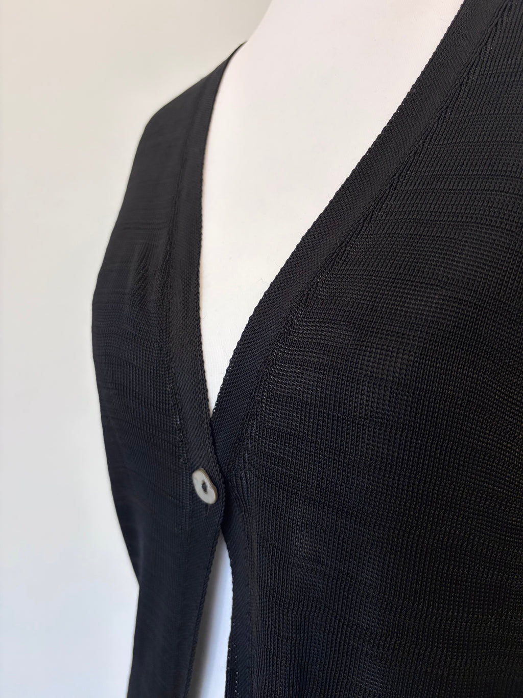 Black longline cardigan with pearl button