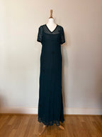 Emerald green dress with velvet details