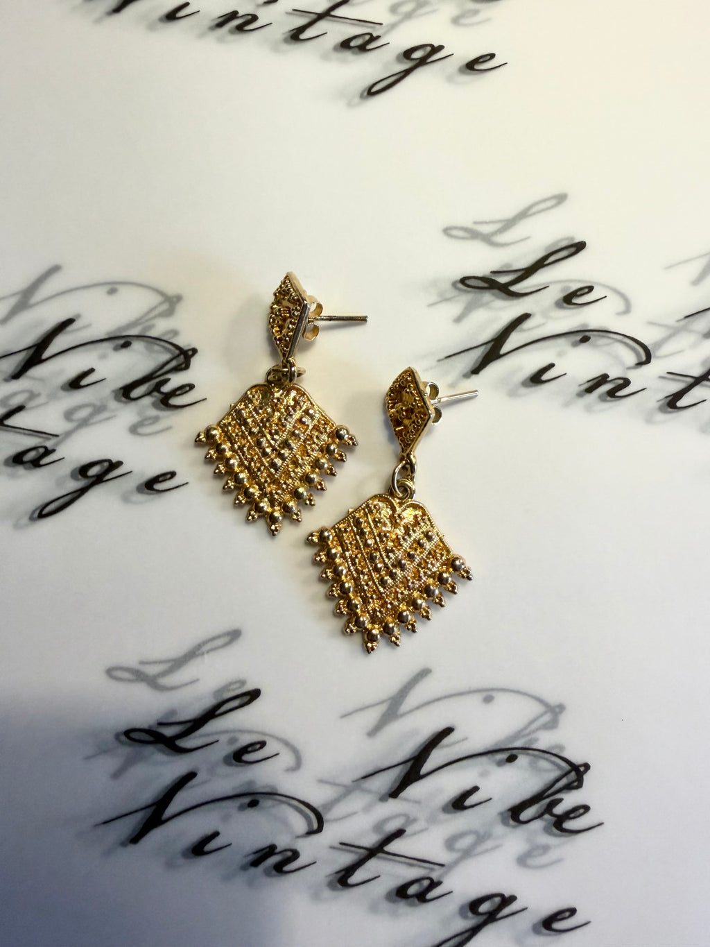 Gold costume jewellery earrings