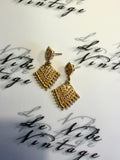 Gold costume jewellery earrings