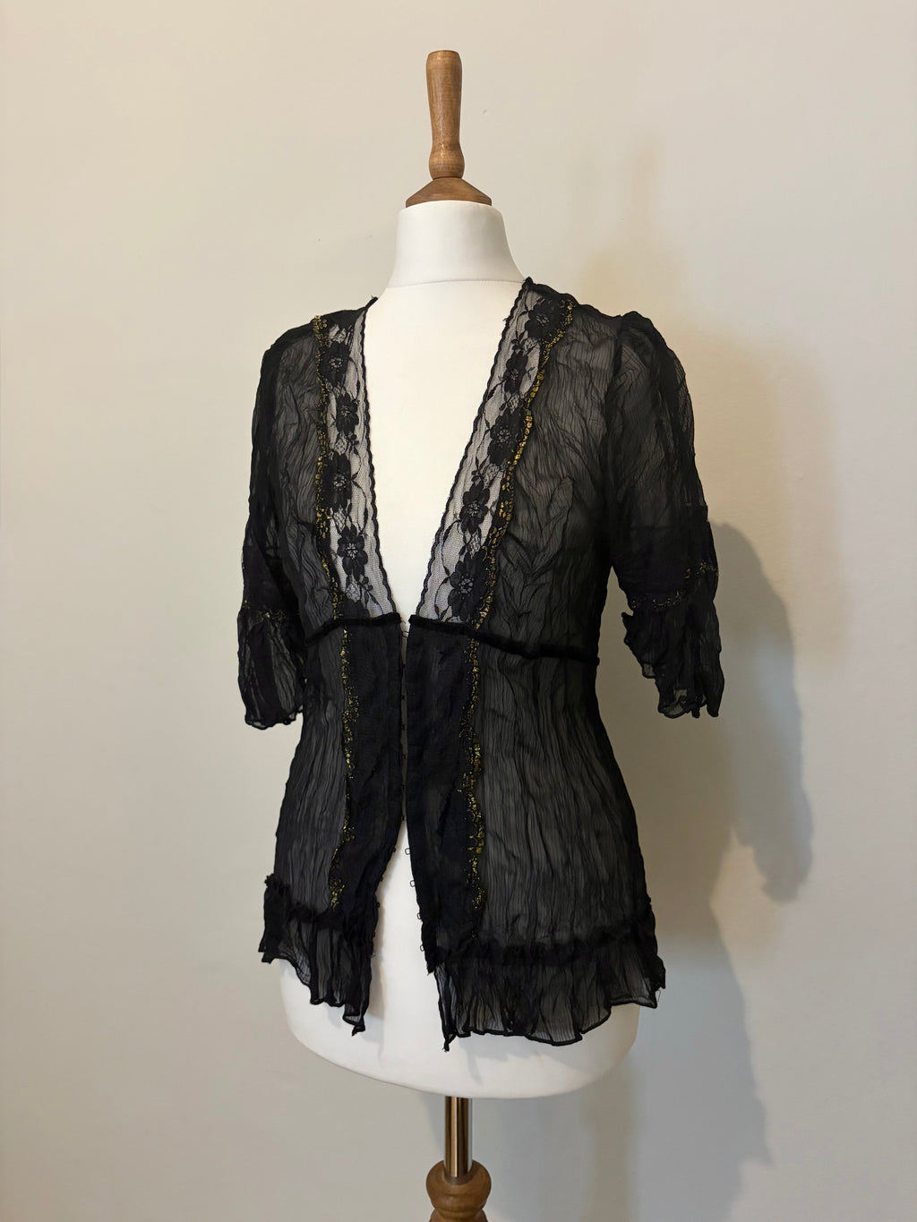 Sheer top with lace details