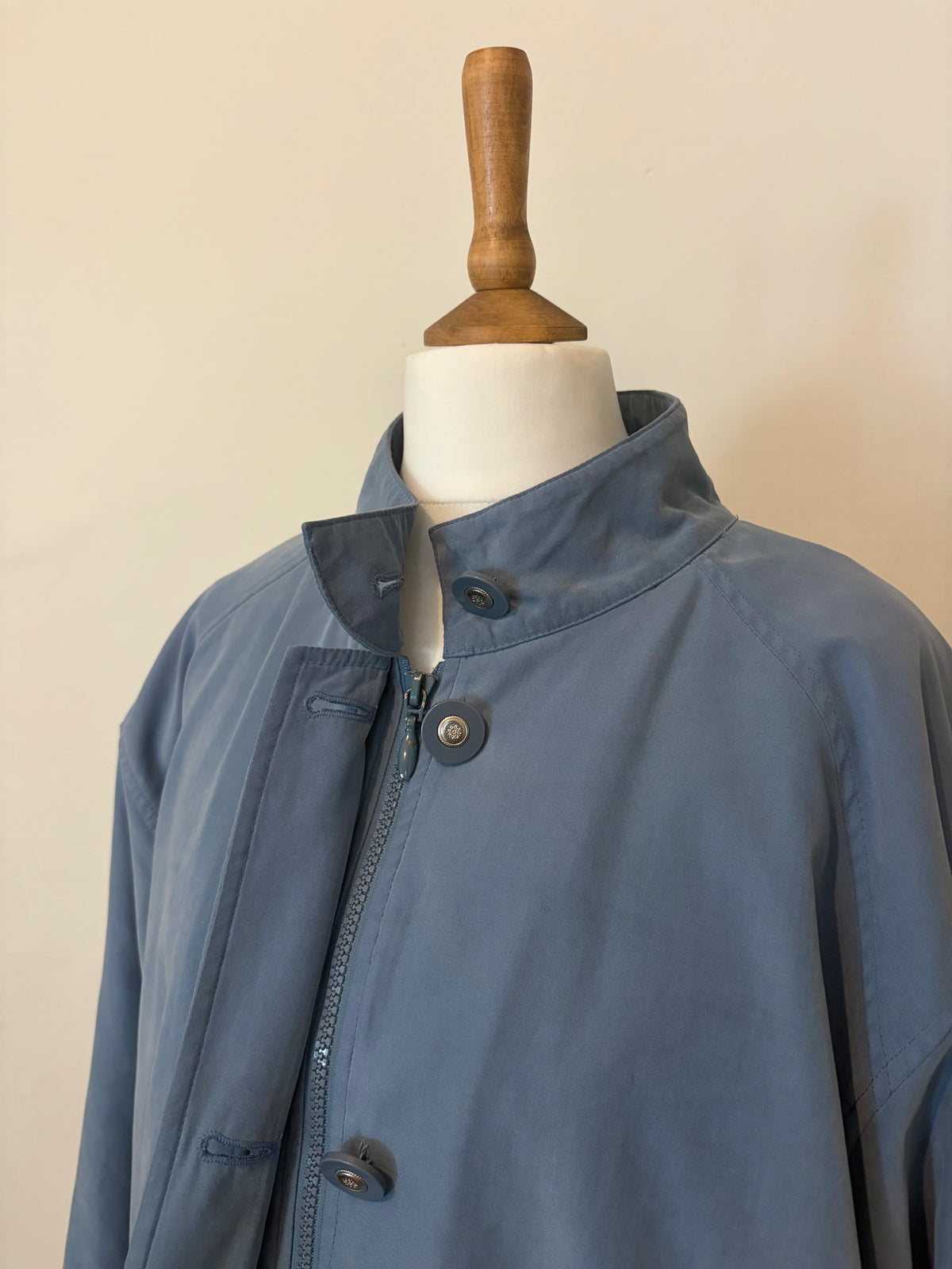 Blue funnel neck bomber jacket