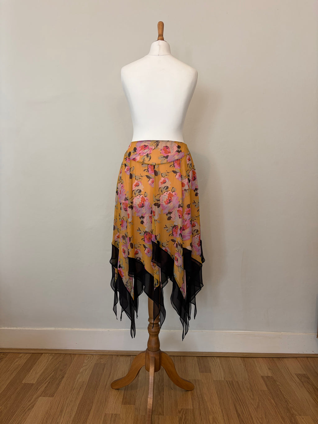 Floral midi skirt with asymmetric hem