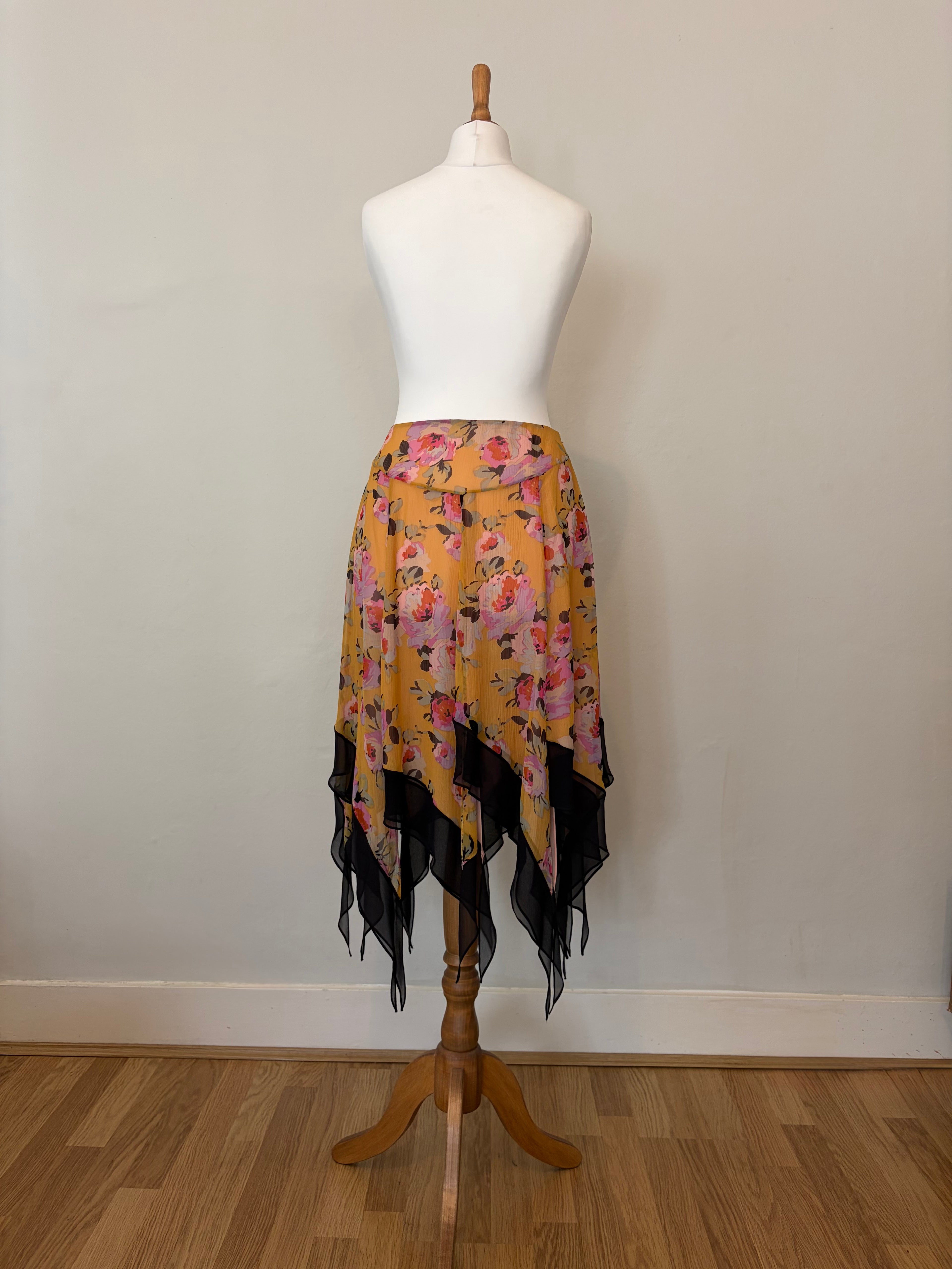 Floral midi skirt with asymmetric hem