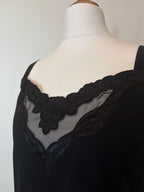 Black camisole top with sheer detail