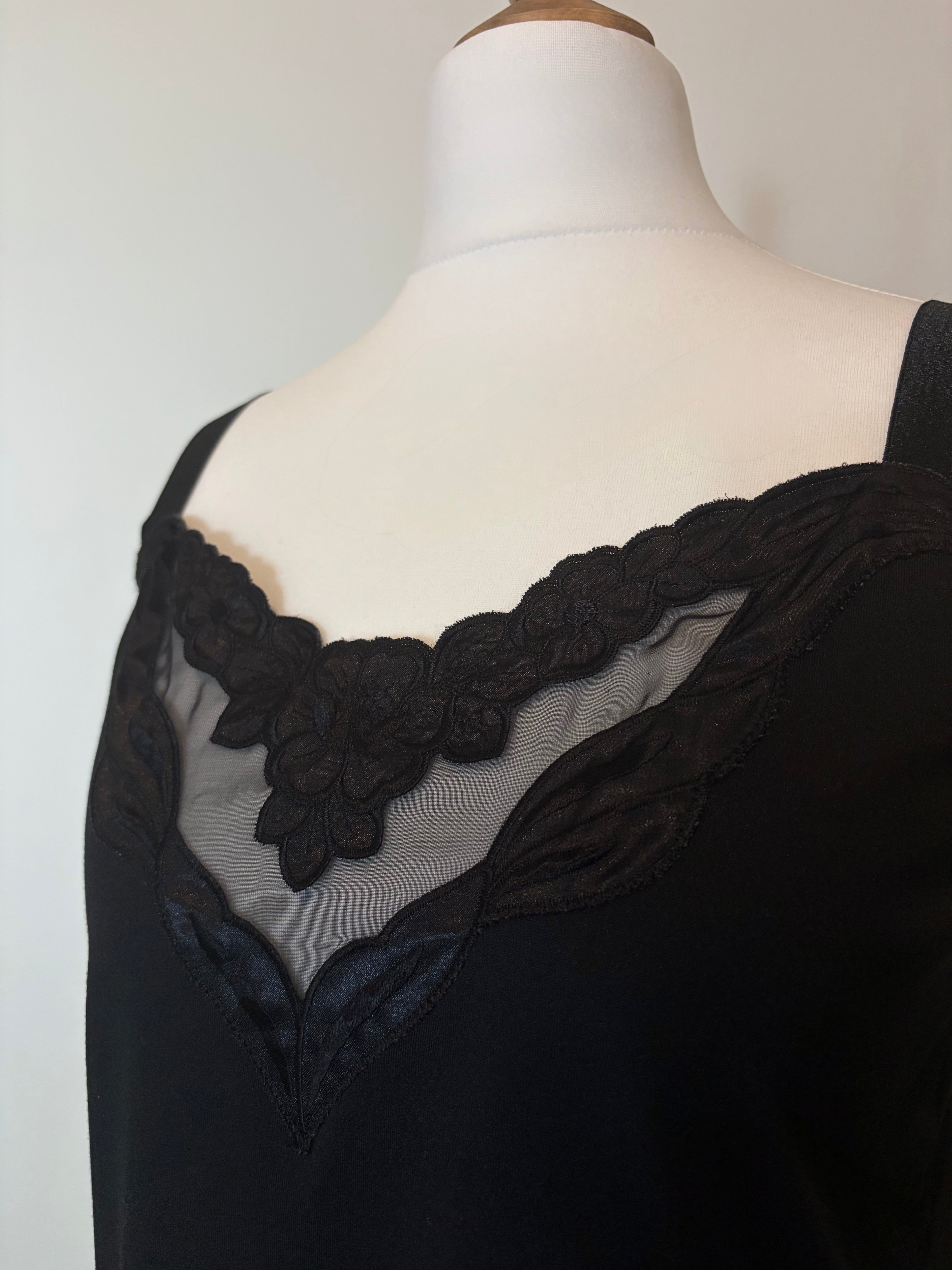 Black camisole top with sheer detail