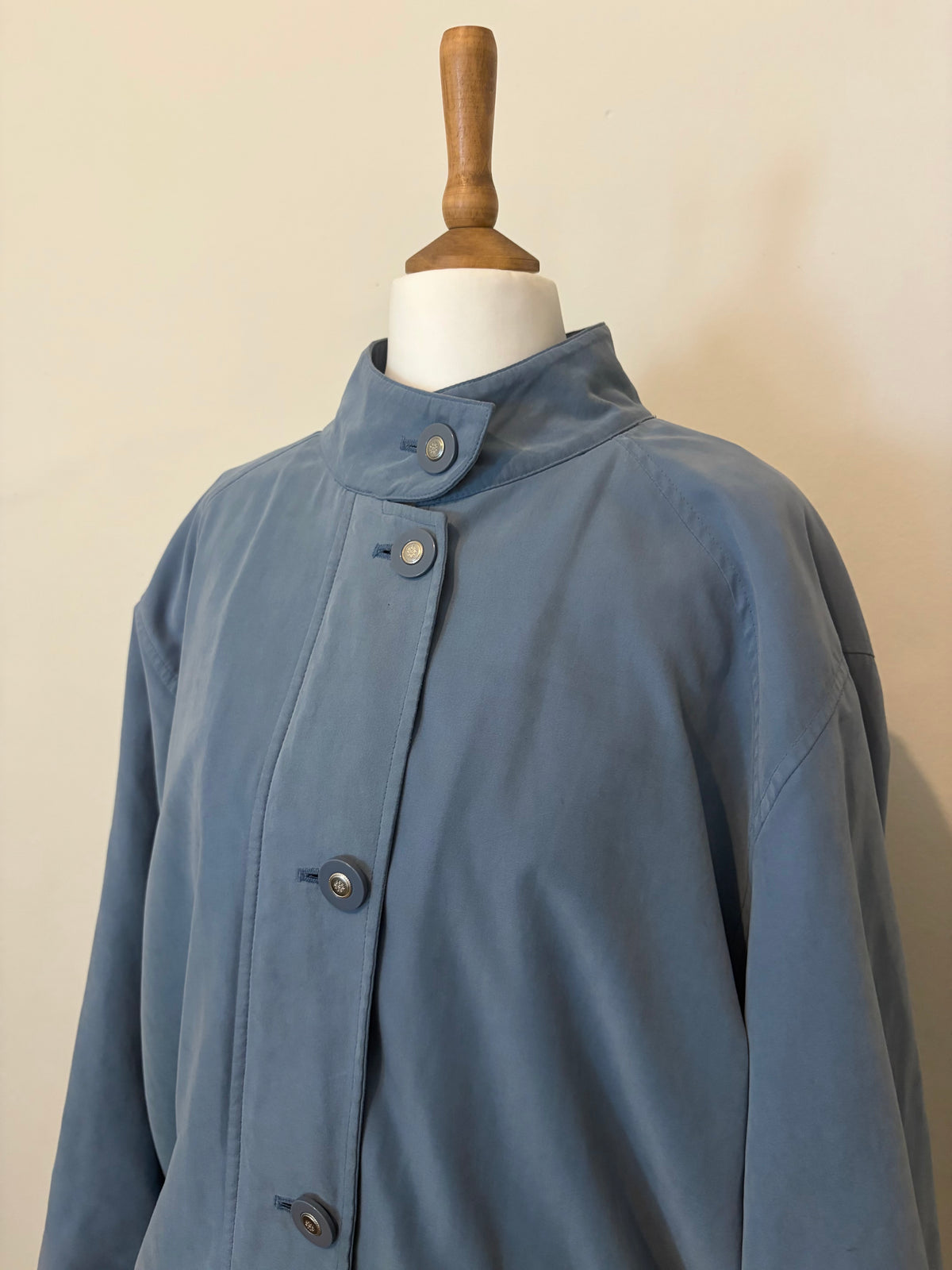 Blue funnel neck bomber jacket