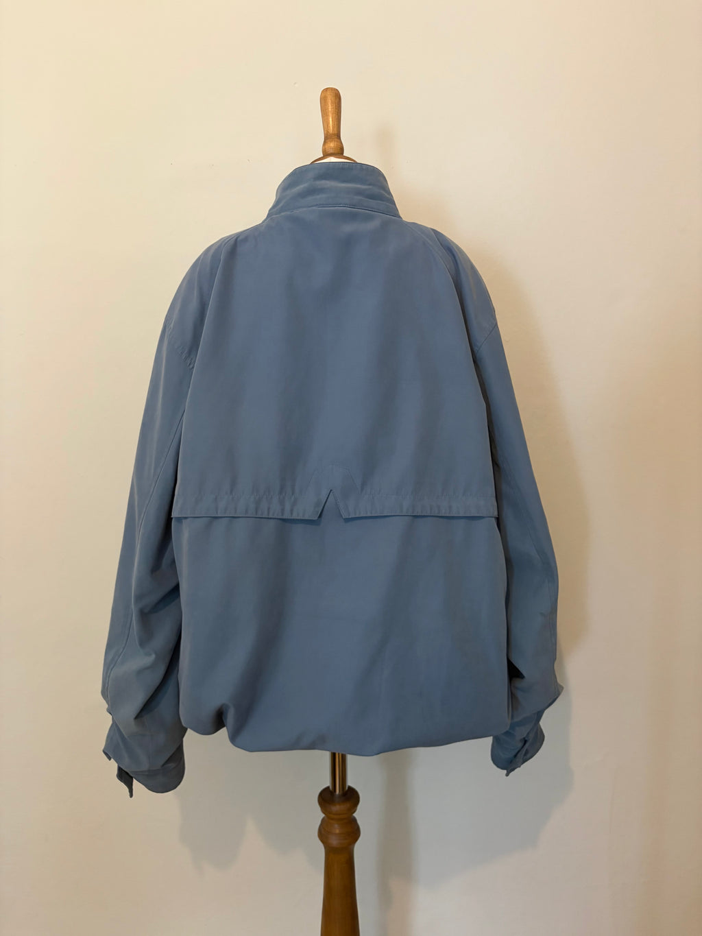 Blue funnel neck bomber jacket