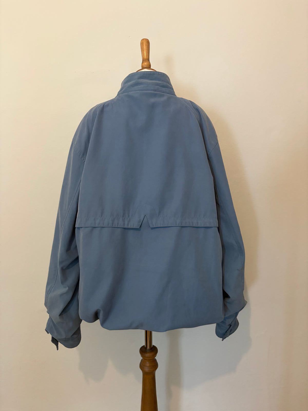 Blue funnel neck bomber jacket