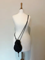 Drawstring beaded bag with tassel