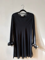 Black mini dress with bow sleeve details