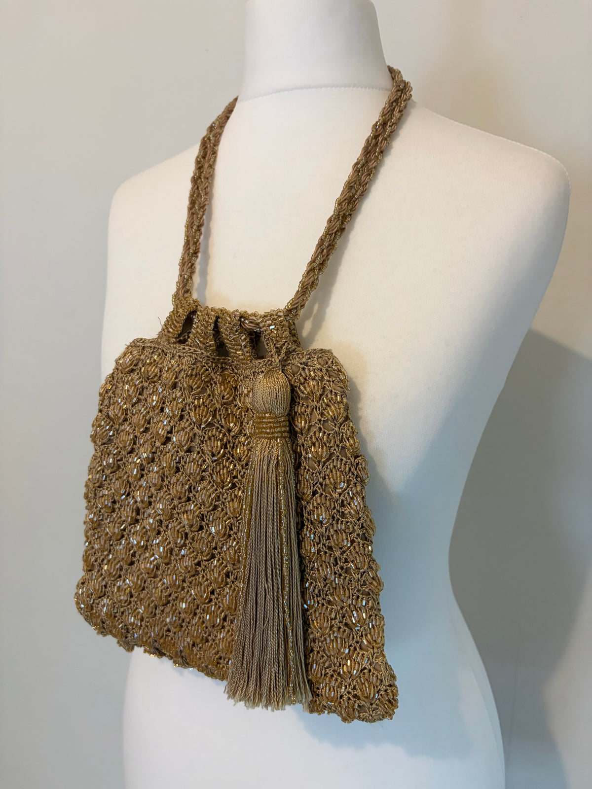 Embellished bag with tassel