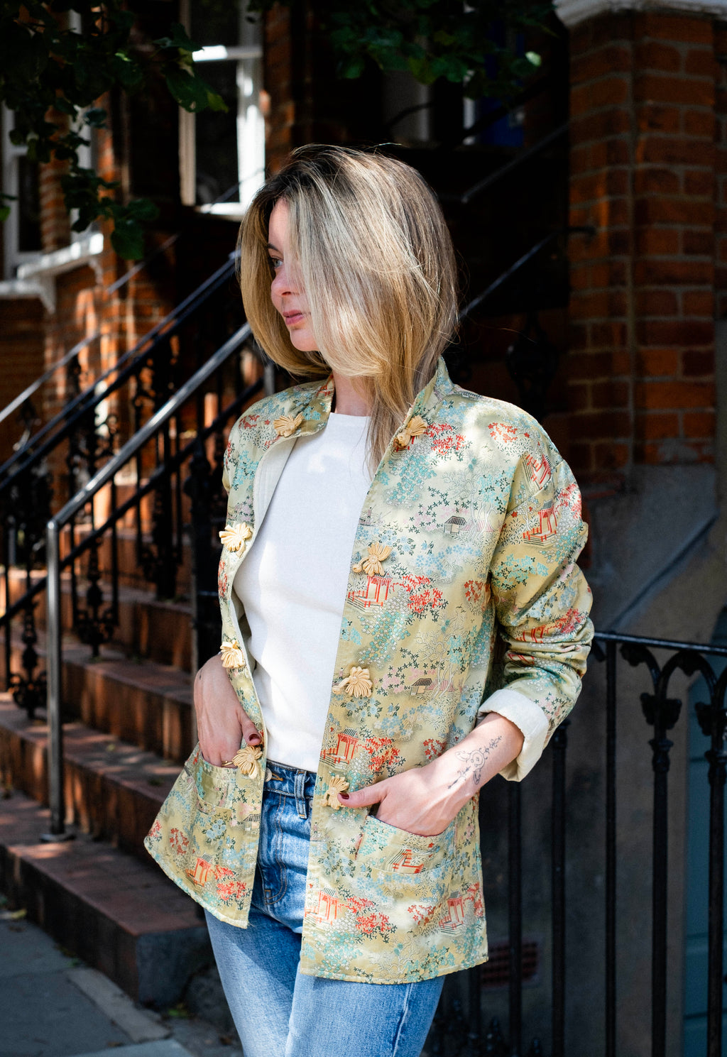 Oriental print jacket with frog closure