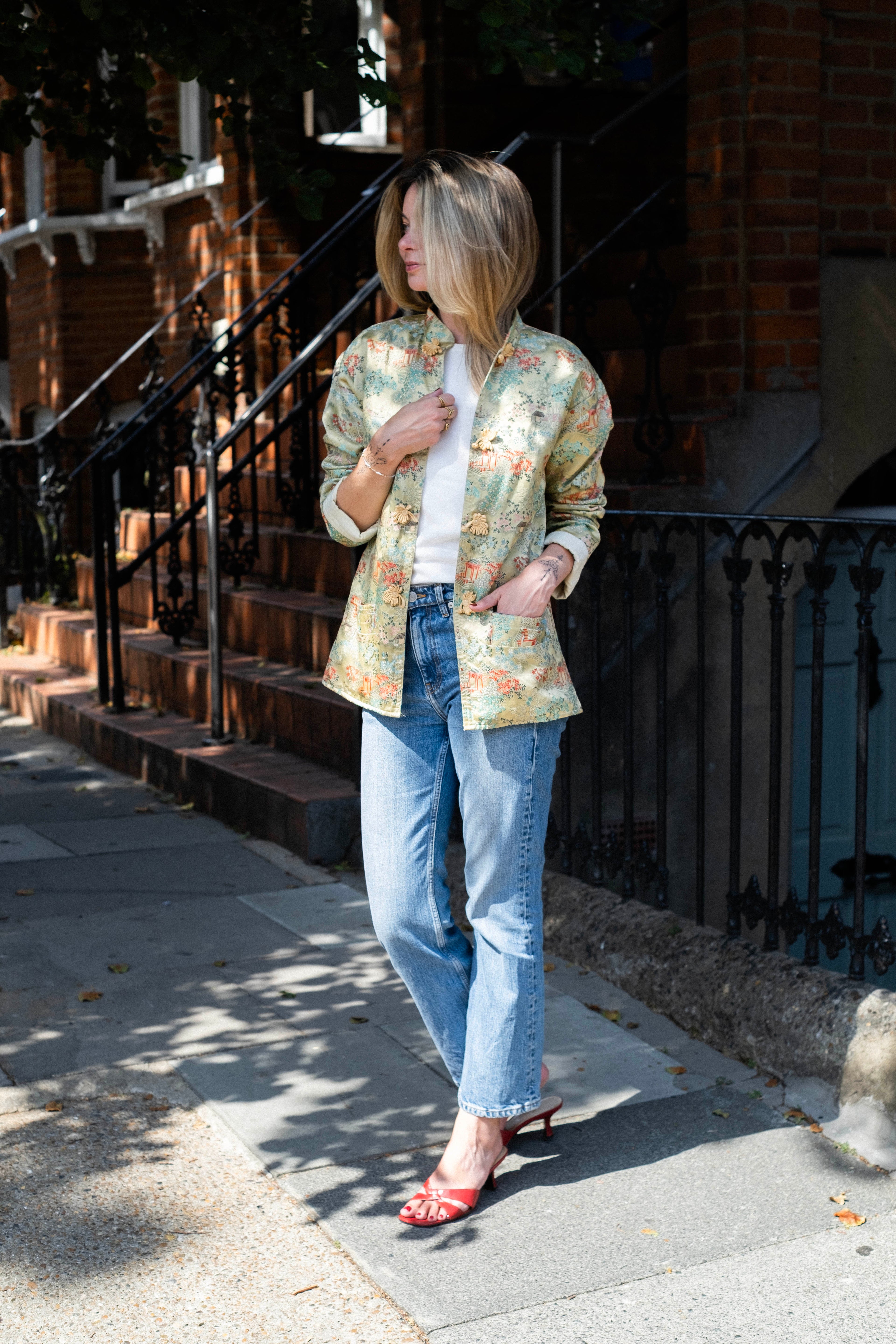 Oriental print jacket with frog closure
