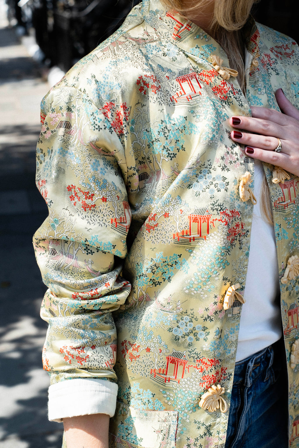 Oriental print jacket with frog closure