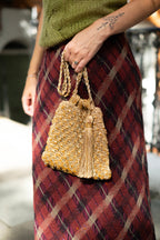 Embellished bag with tassel