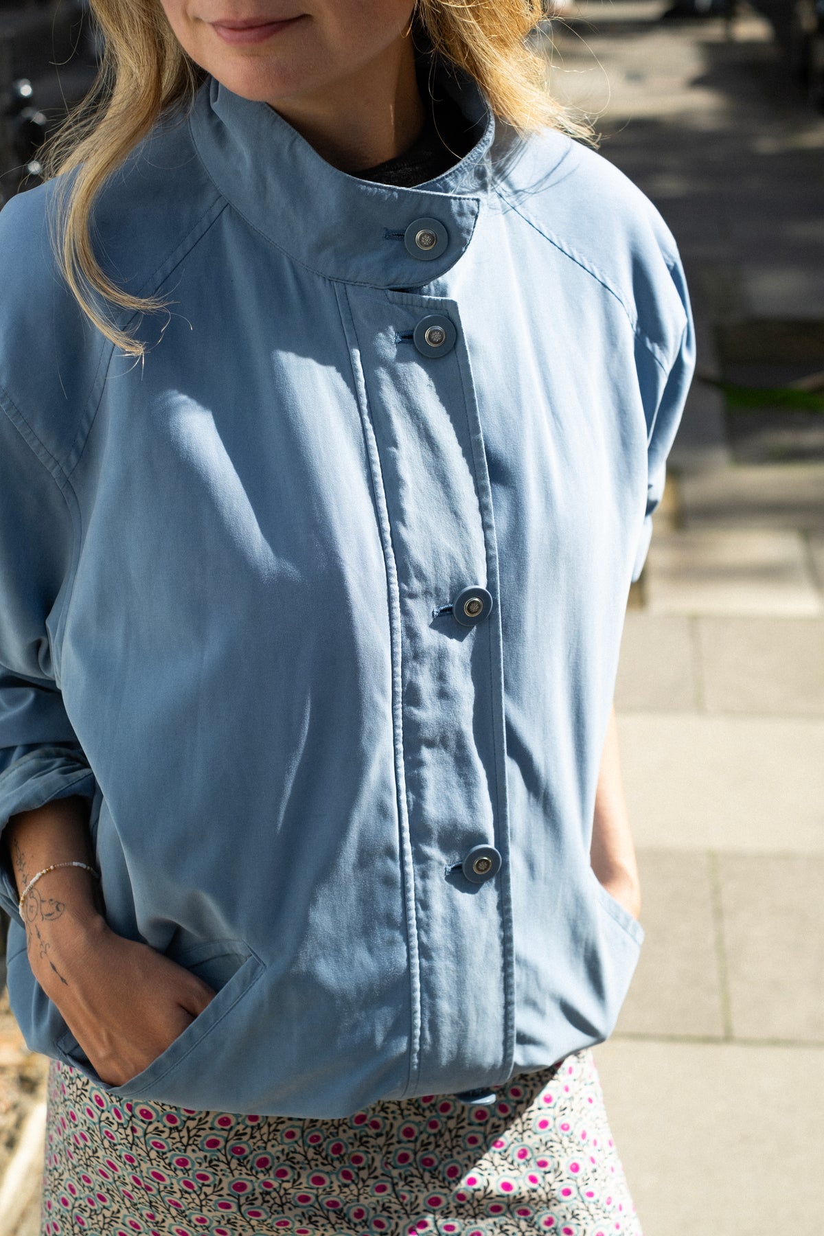 Blue funnel neck bomber jacket