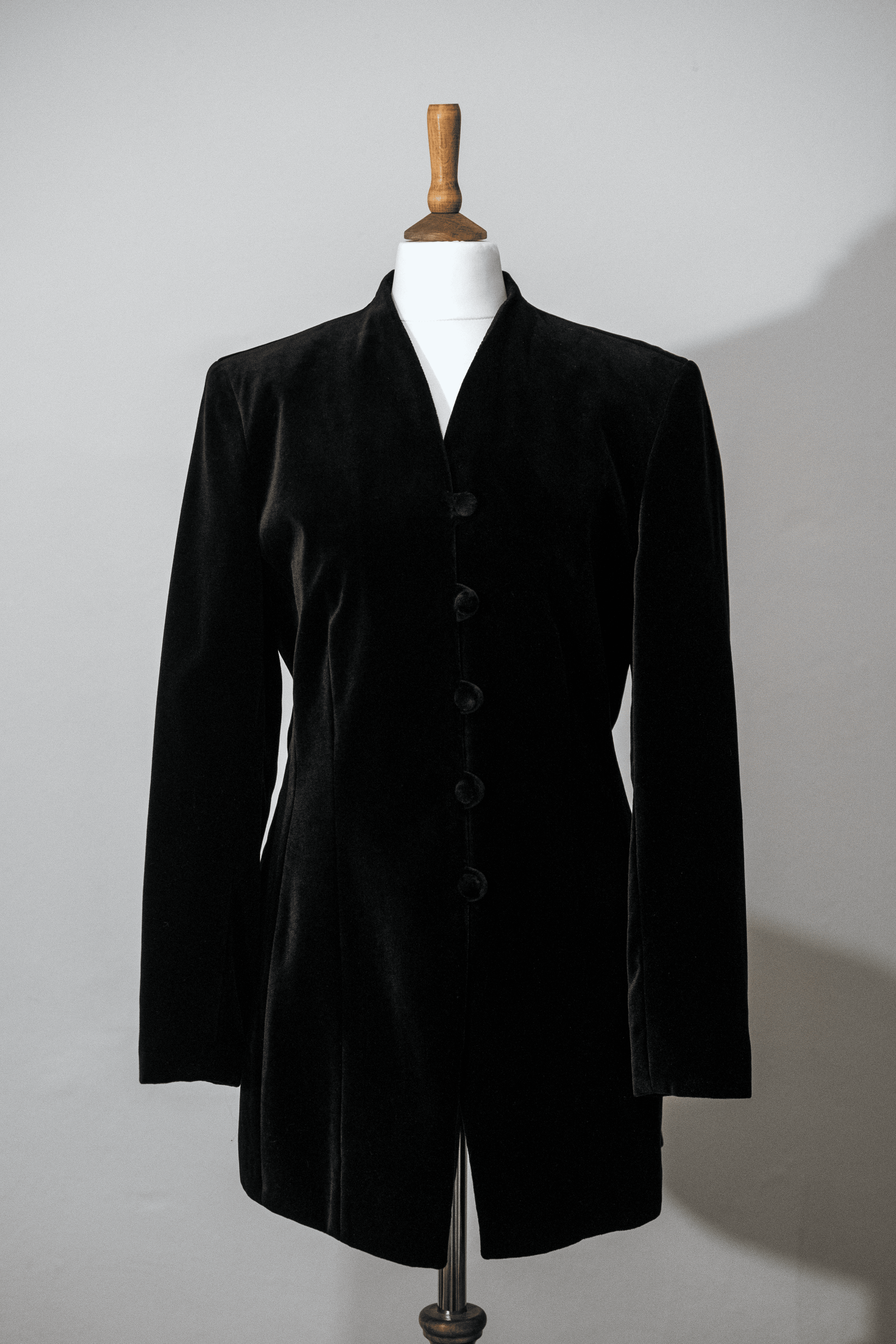 Black velvet jacket with covered buttons