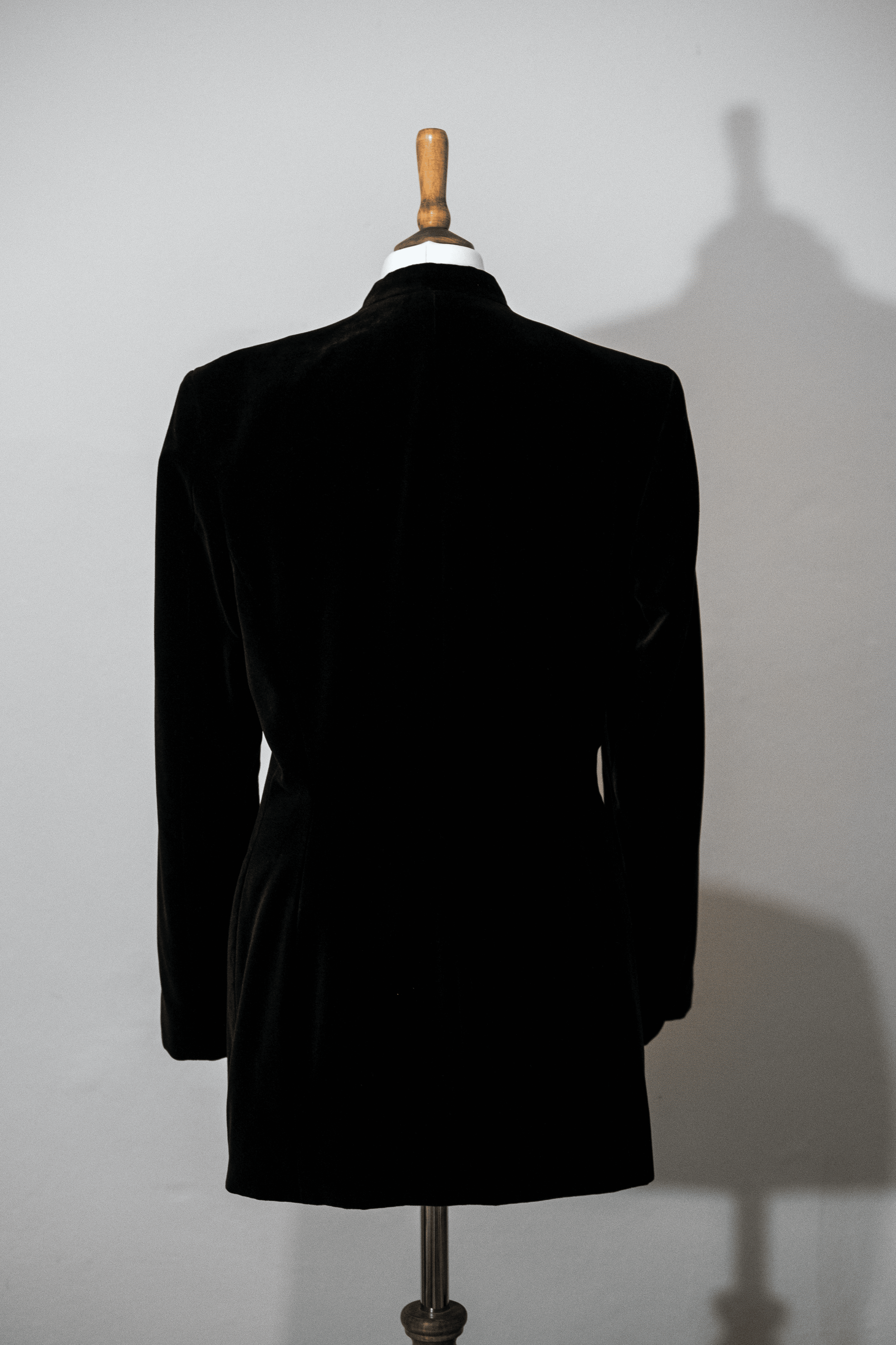 Black velvet jacket with covered buttons