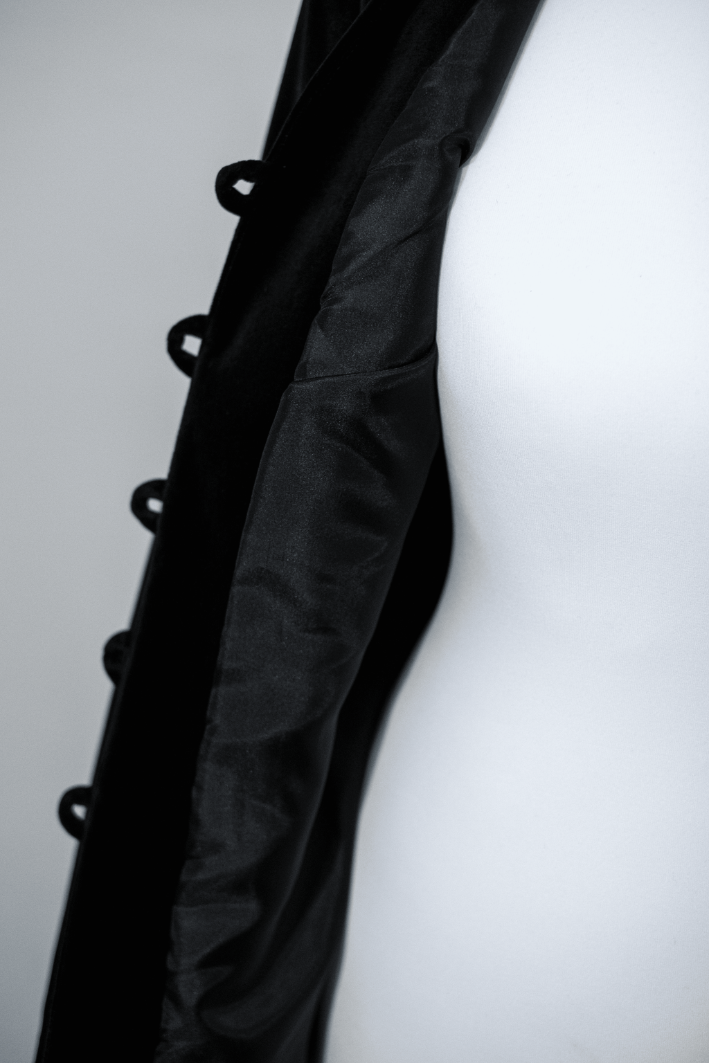 Black velvet jacket with covered buttons