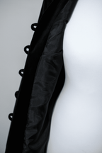 Black velvet jacket with covered buttons