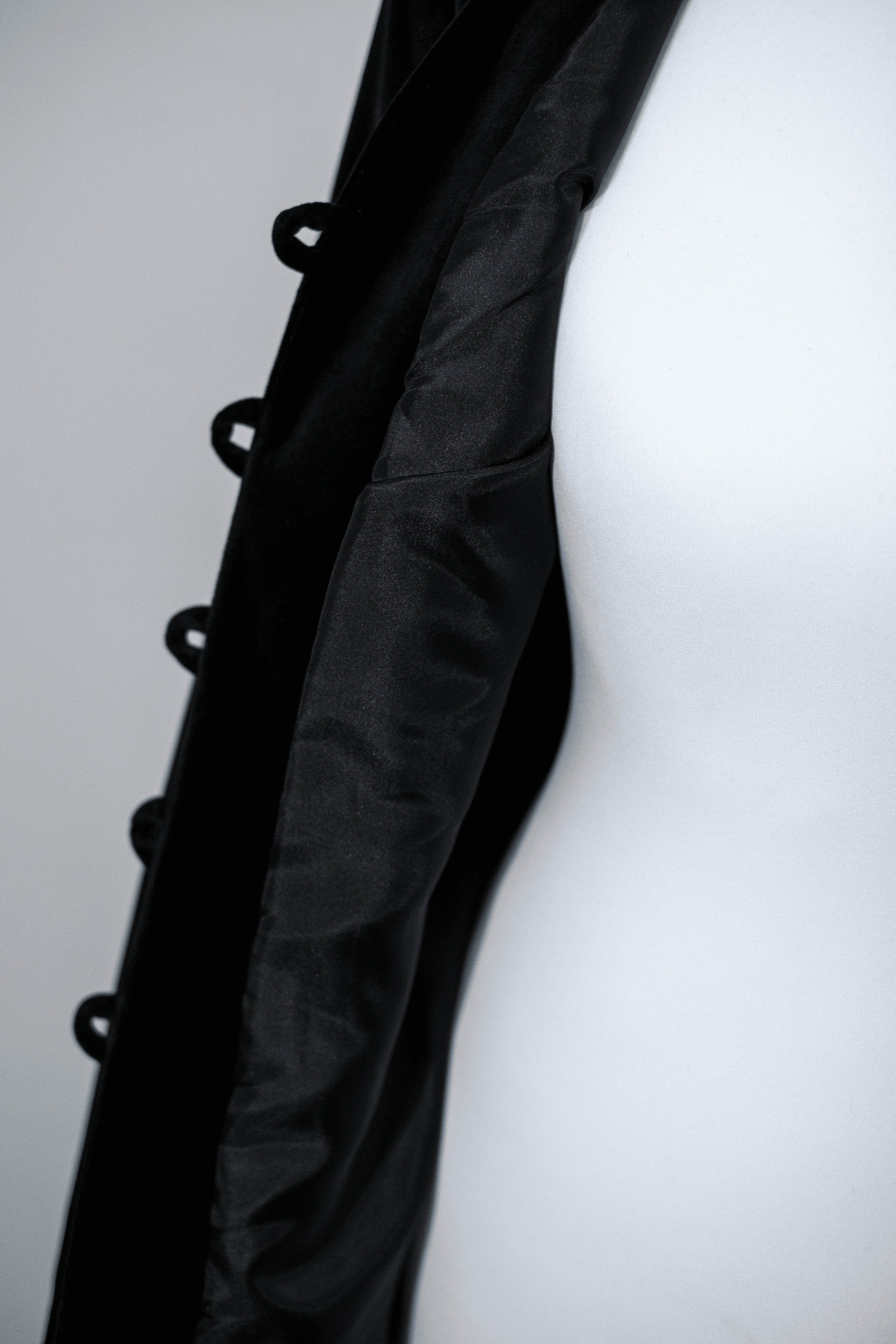 Black velvet jacket with covered buttons