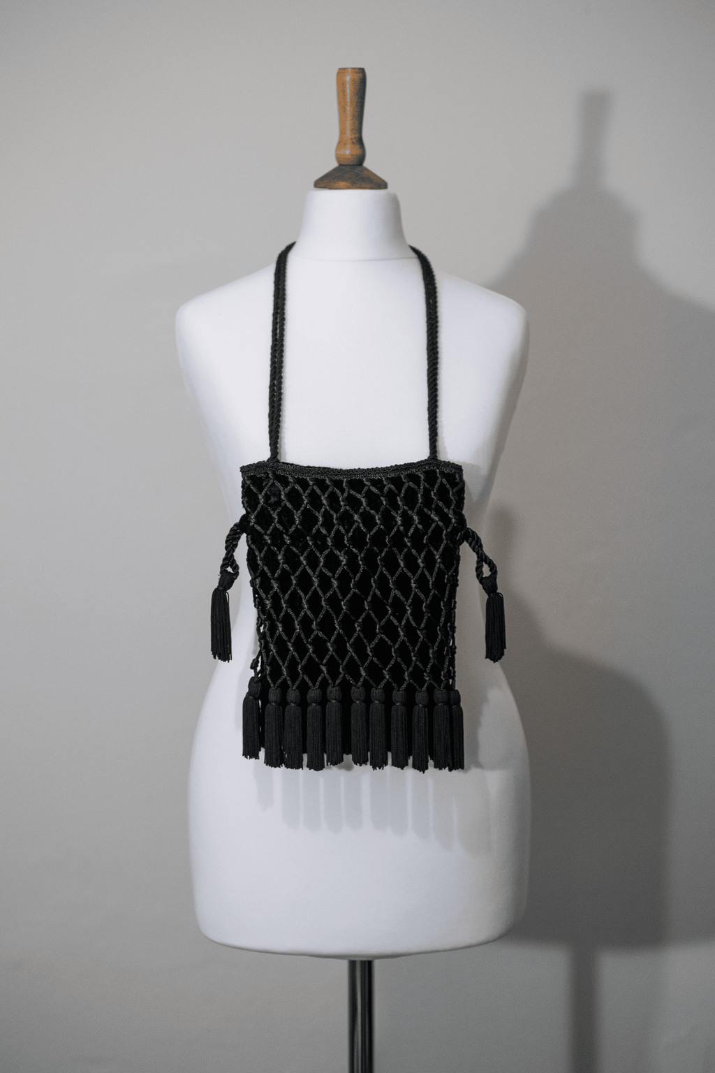 Tassel detail velvet bag