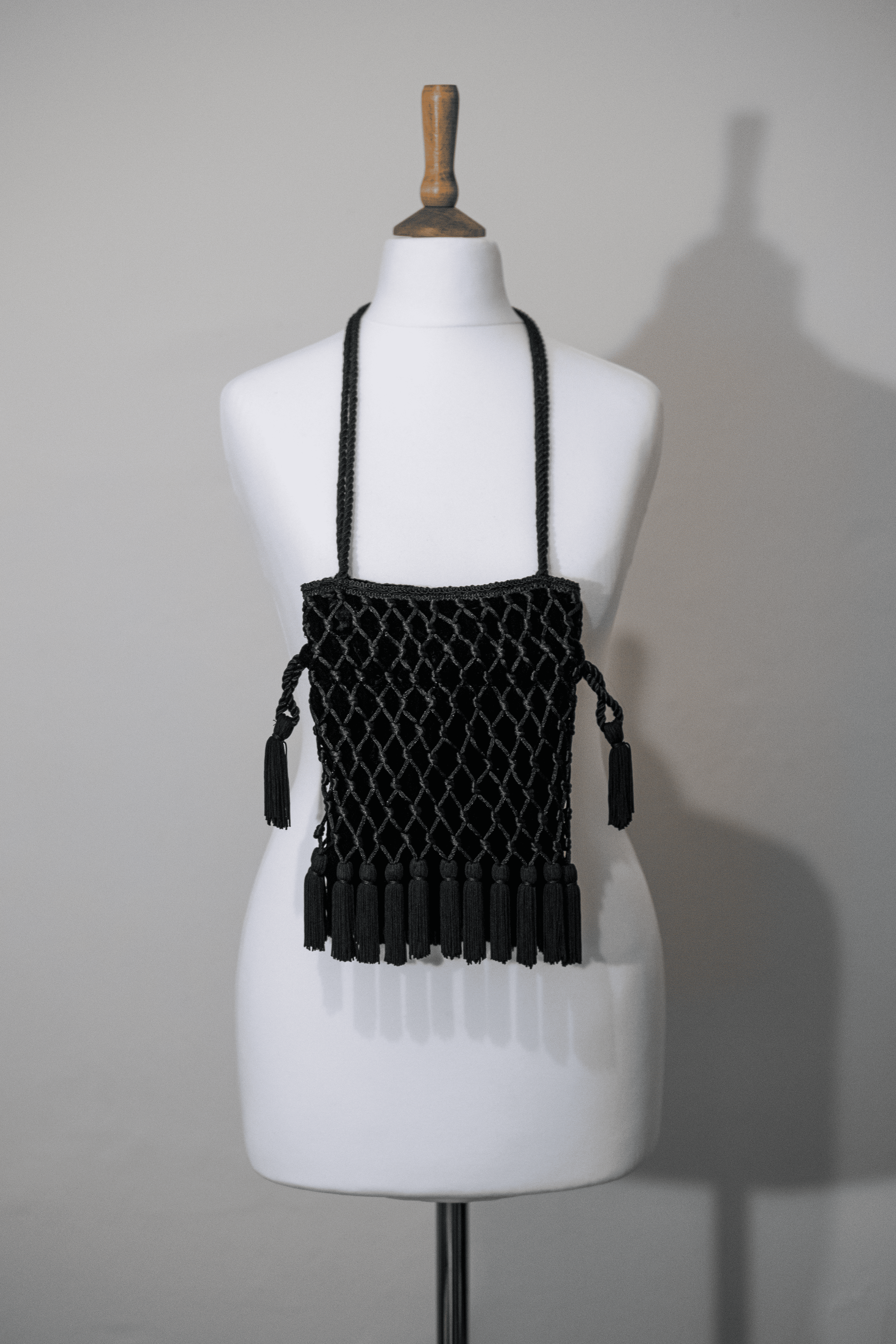 Tassel detail velvet bag