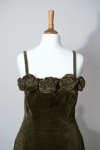 Velvet dress with flower corsages