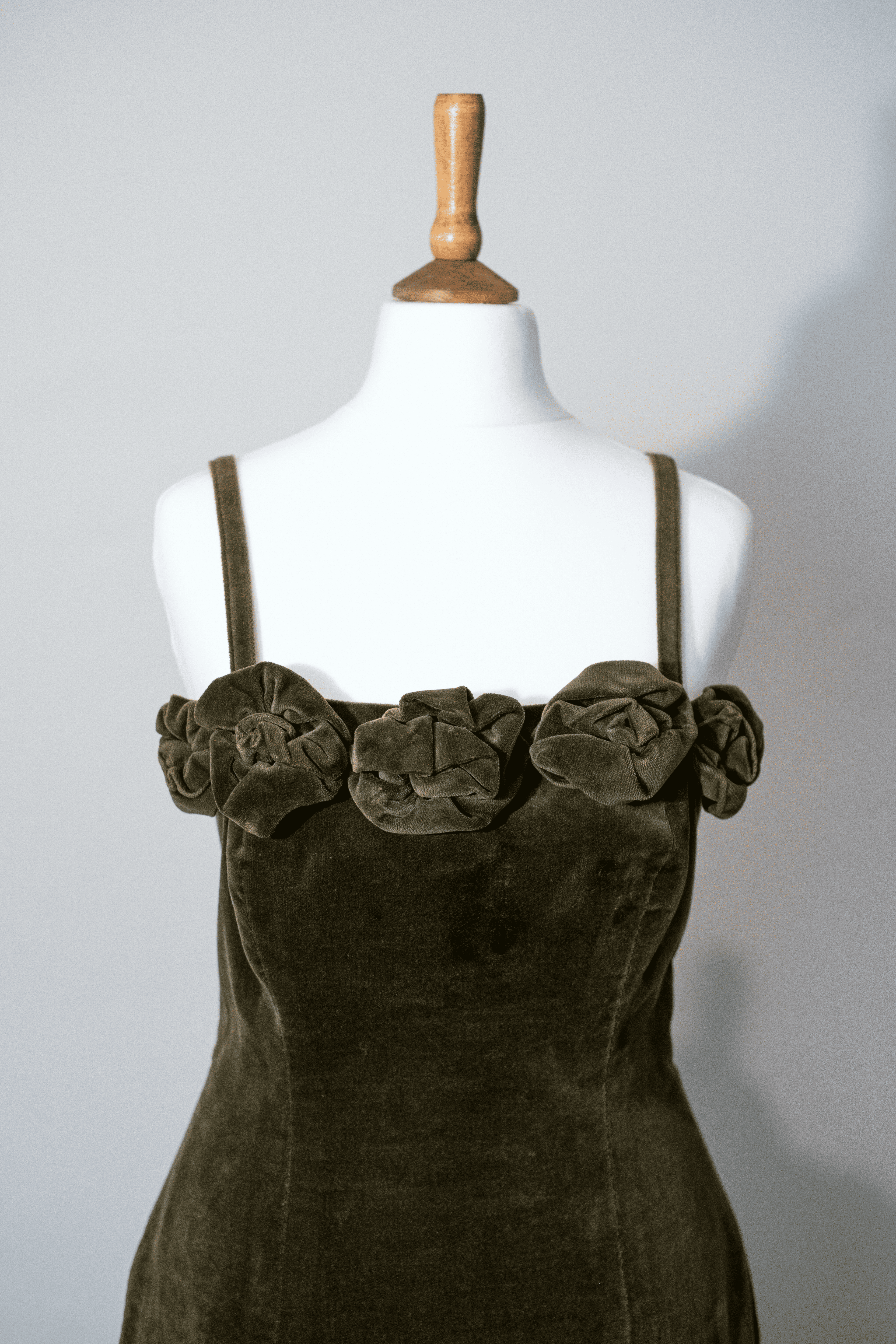 Velvet dress with flower corsages