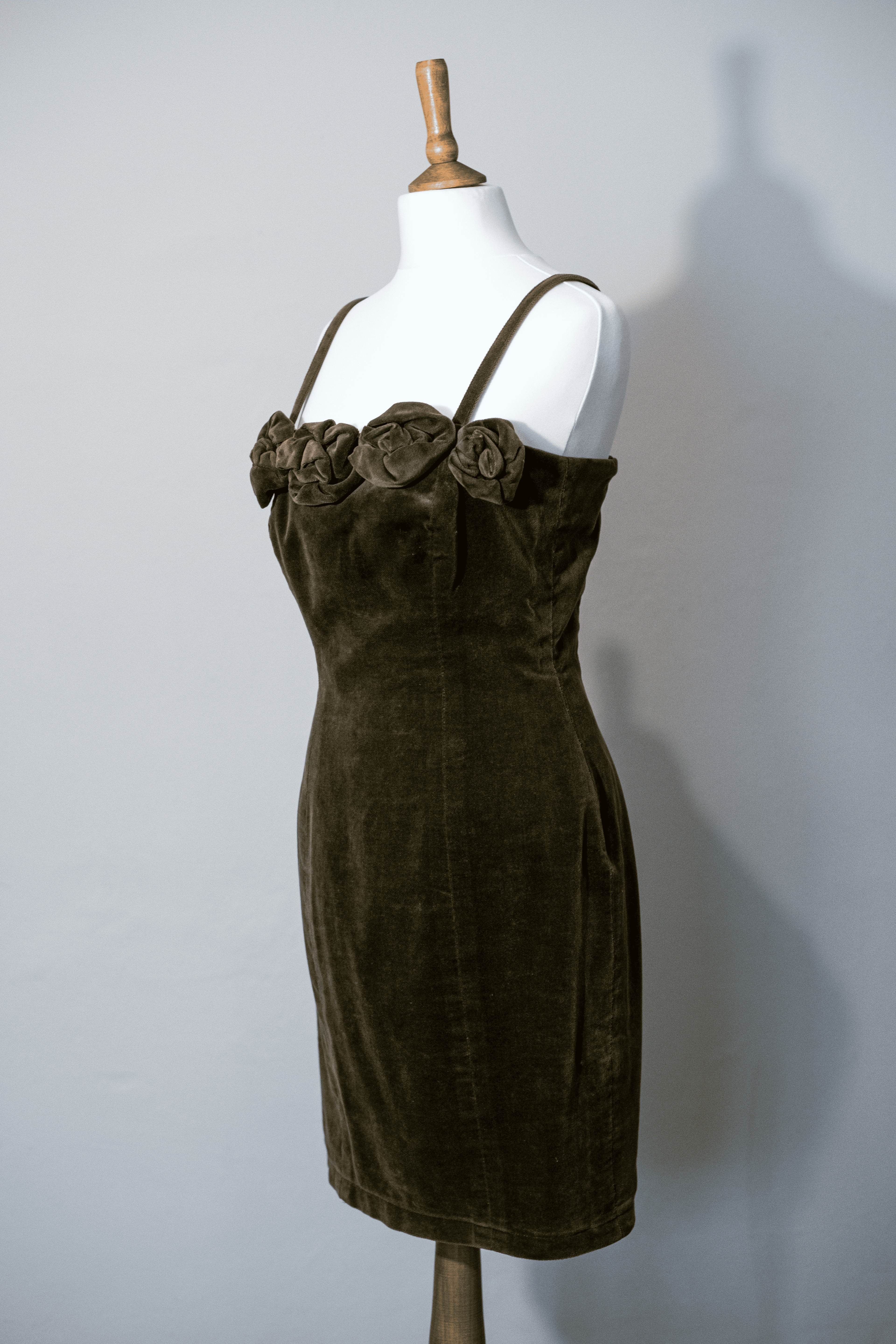 Velvet dress with flower corsages