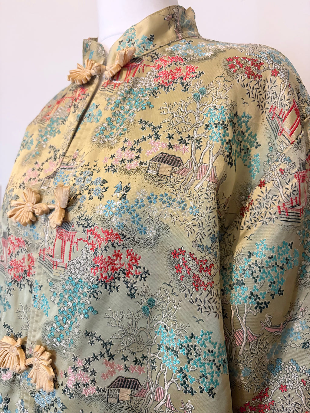 Oriental print jacket with frog closure
