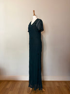 Emerald green dress with velvet details