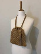 Embellished bag with tassel