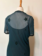Emerald green dress with velvet details