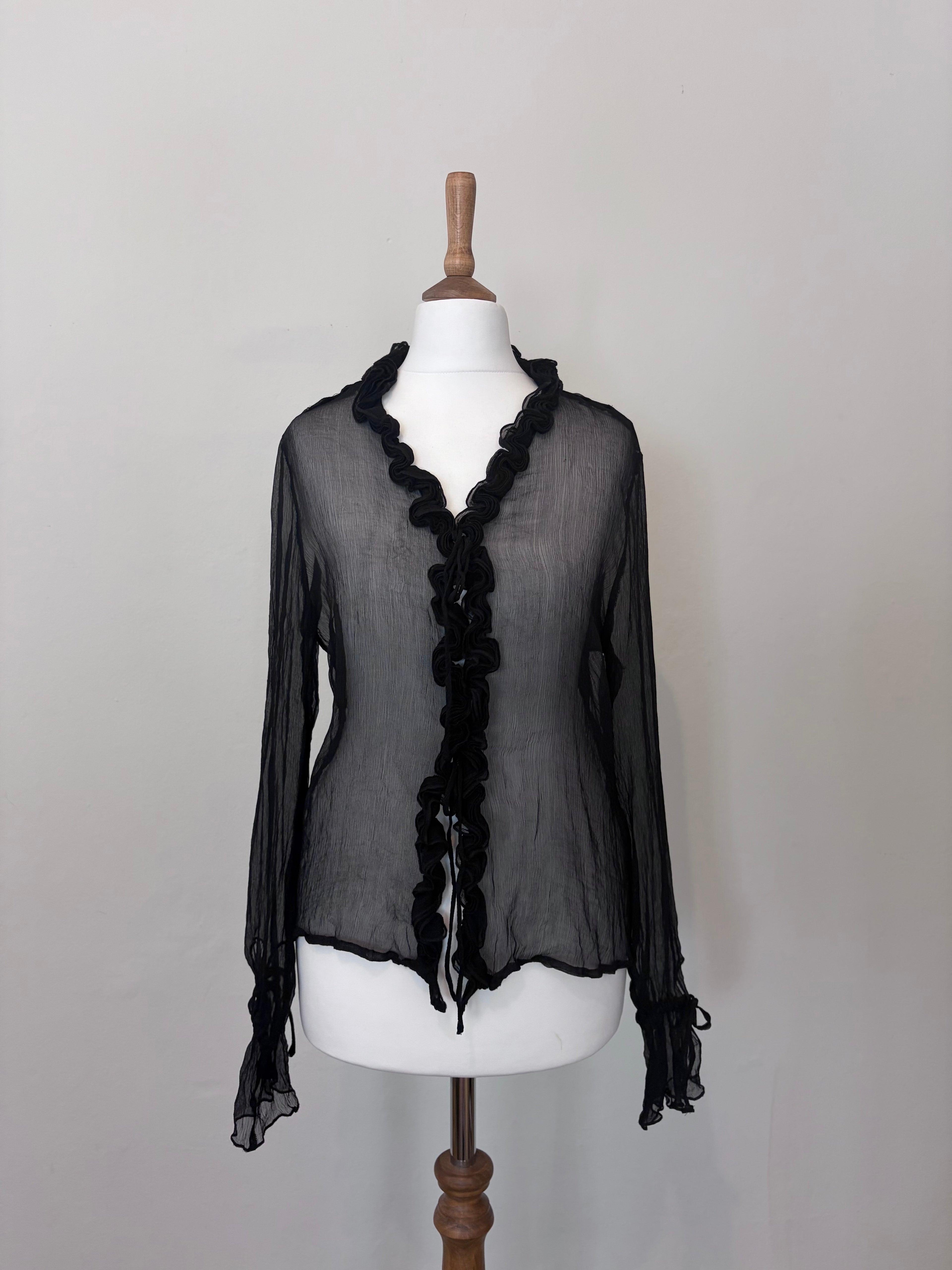 Black sheer top with ruffles