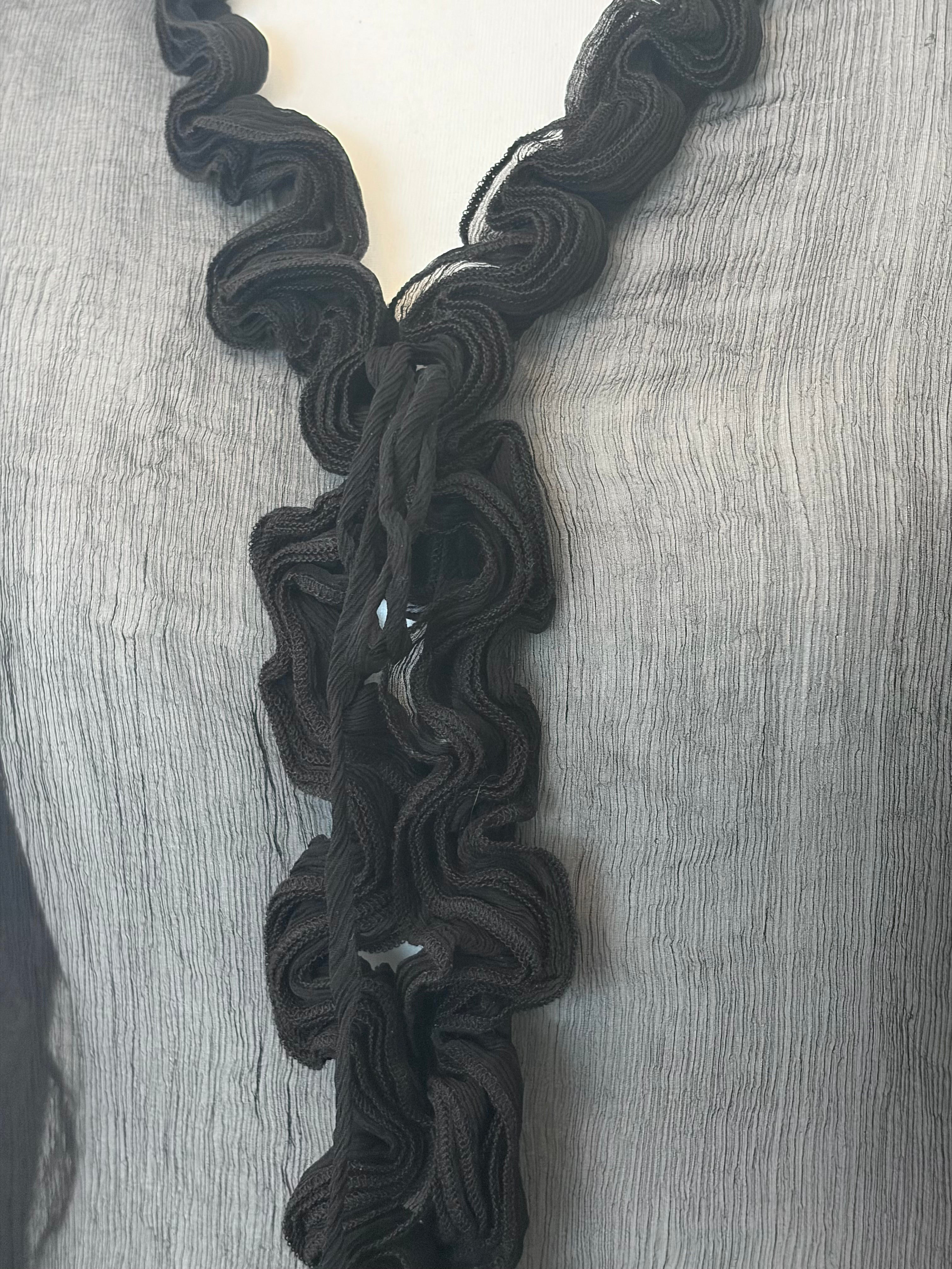 Black sheer top with ruffles