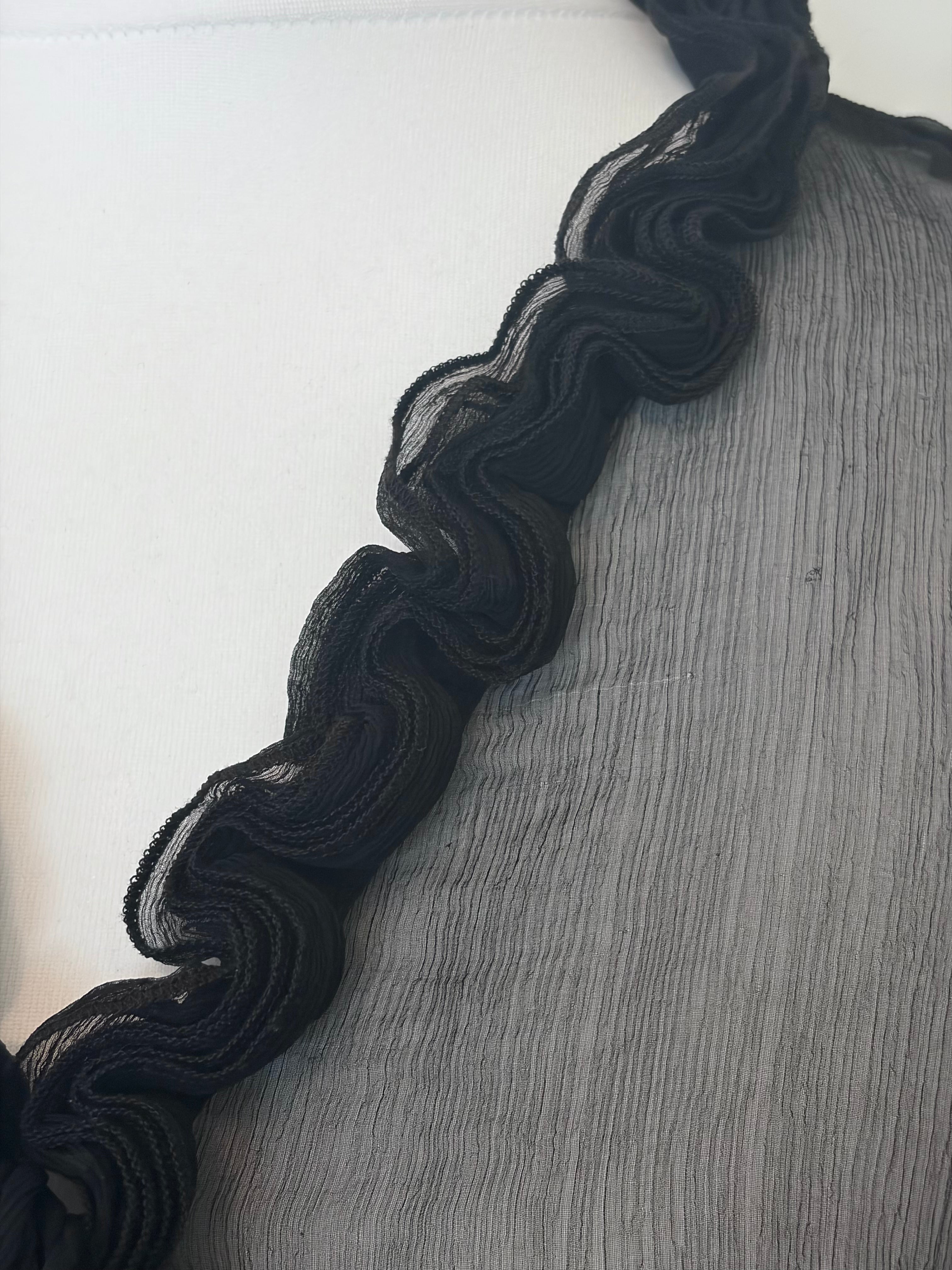 Black sheer top with ruffles