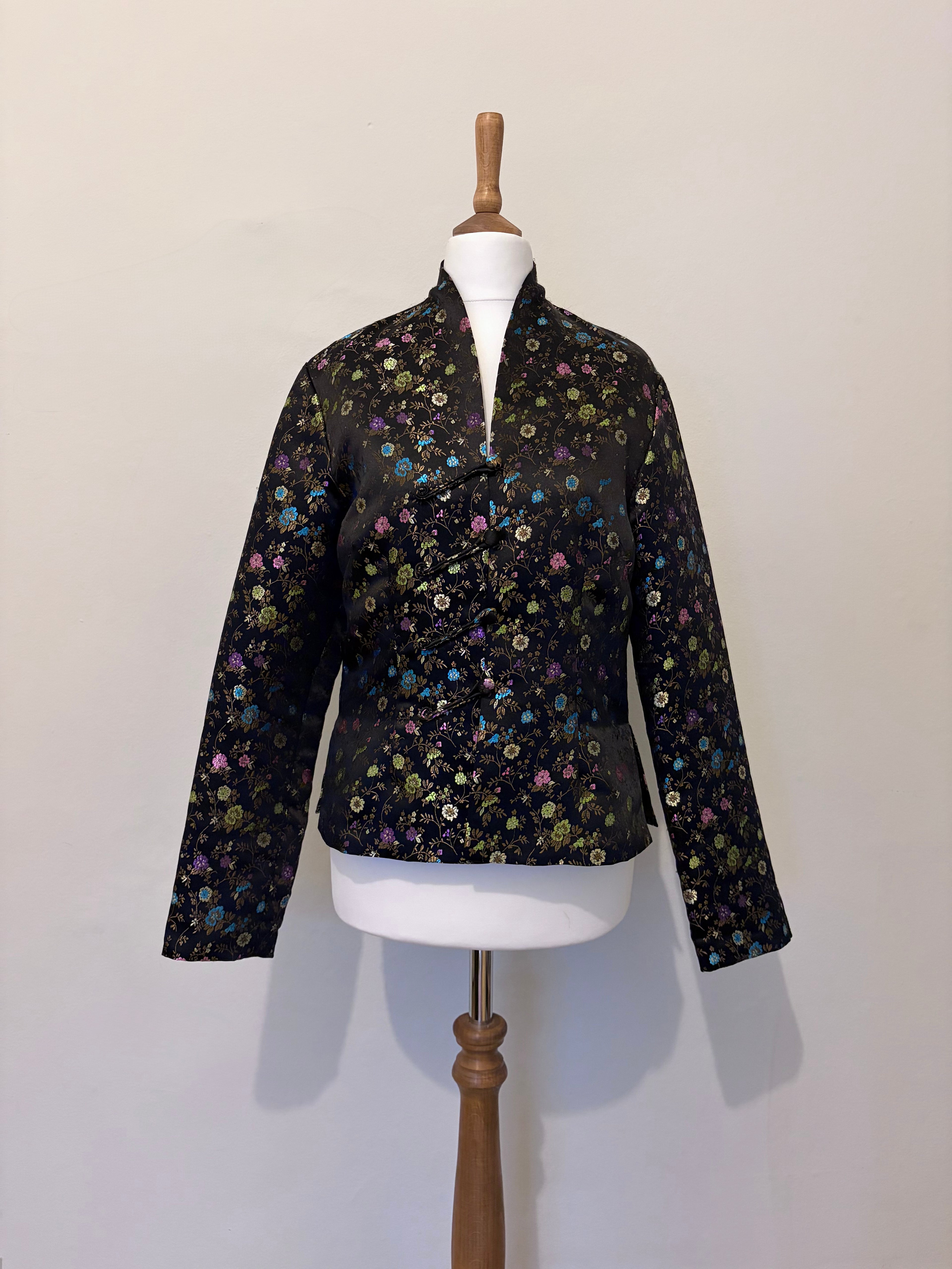 Floral print black jacket with button detail
