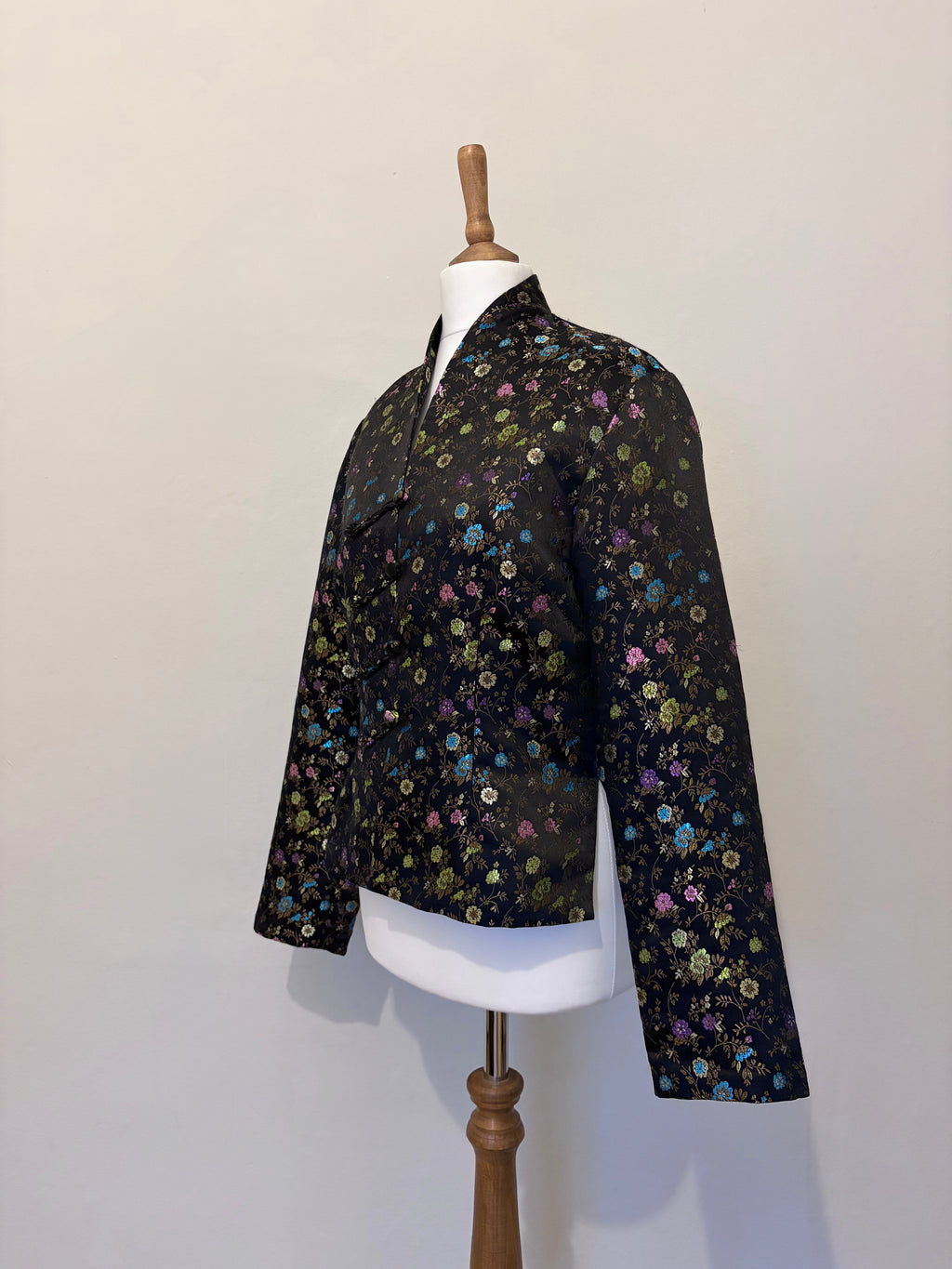 Floral print black jacket with button detail