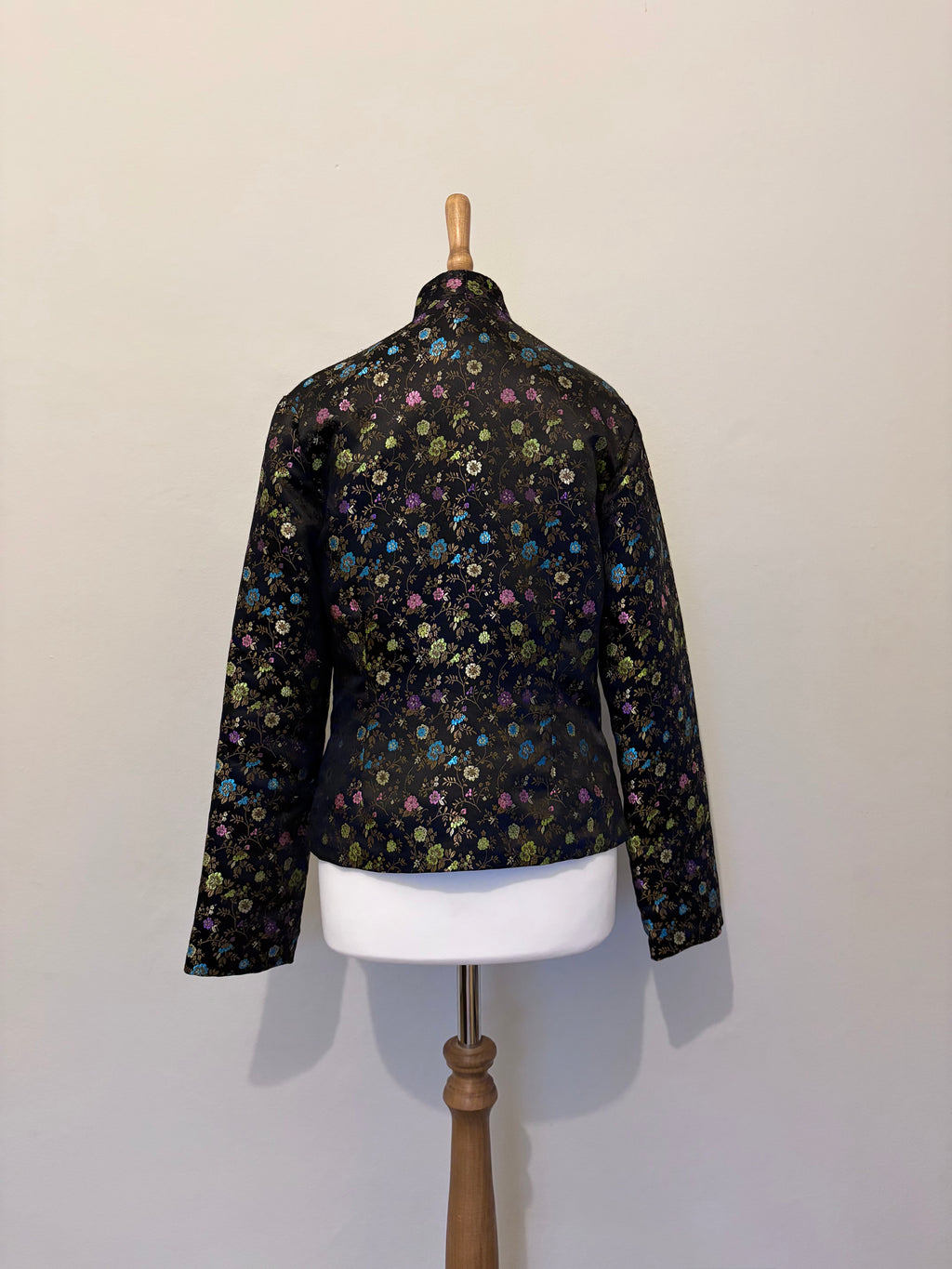 Floral print black jacket with button detail