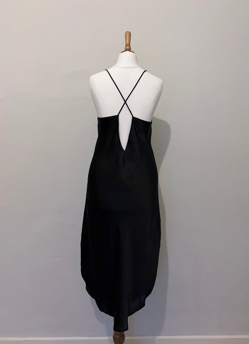 Black slip dress with tassel detail