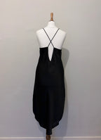 Black slip dress with tassel detail